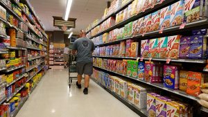 July inflation report likely to show prices climbed for the first time in a year
