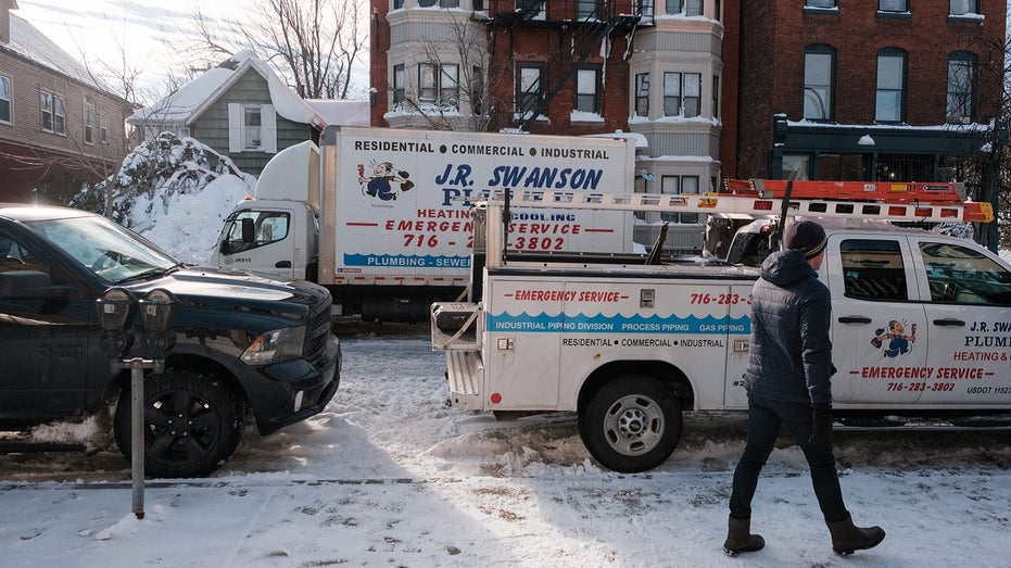 plumbing truck outside home in New York