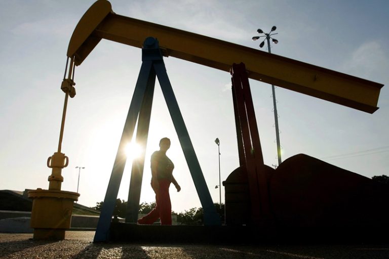 Oil settles lower but notches weekly gain ahead of OPEC+ decision