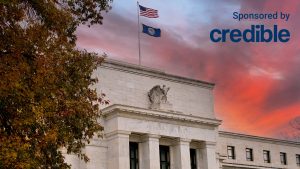 Fed holds interest rate steady as it waits to see impact of tariffs