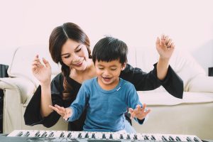 Why Teaching Your Child Music Builds Financial Success